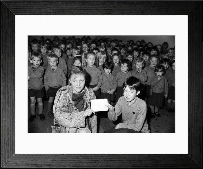 Framed Print : Many thanks... Ten-year-old Sarah Bett, right, of Mount School Framed Print : Many thanks... Ten-year-old Sarah Bett, right, of Mount School