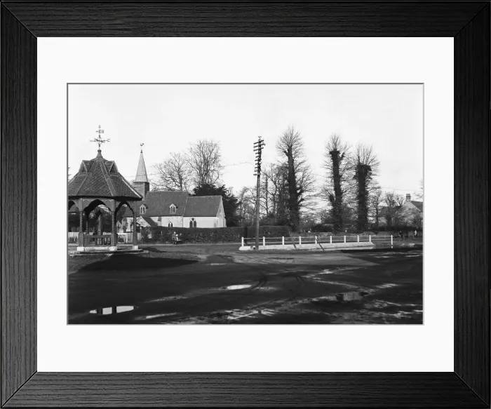 Framed Print : St Giles church at Ickenham, London, in the fore ground is the village pump Circa 1930 Framed Print : St Giles church at Ickenham, London, in the fore ground is the village pump Circa 1930