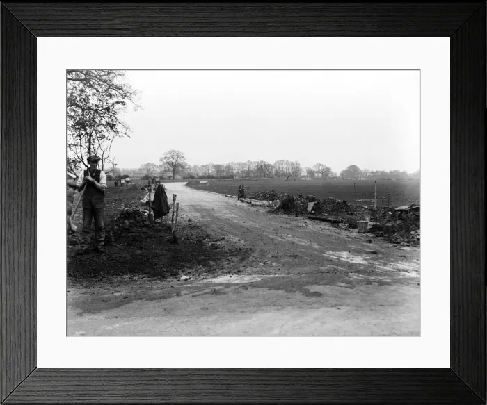 Framed Print : Construction of a new road off of Long Lane signals the beginning of a new housing Framed Print : Construction of a new road off of Long Lane signals the beginning of a new housing