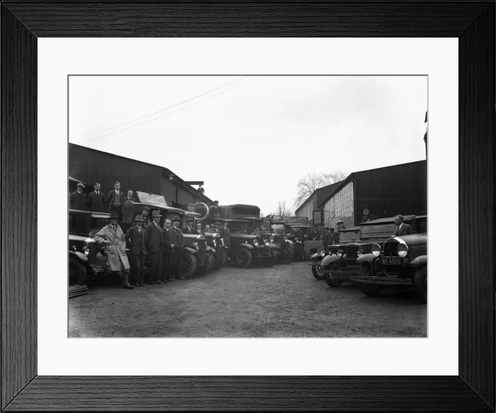 Framed Print : The staff of Uxbridge builders merchants Kirby Brothers pose beside their lorries Framed Print : The staff of Uxbridge builders merchants Kirby Brothers pose beside their lorries