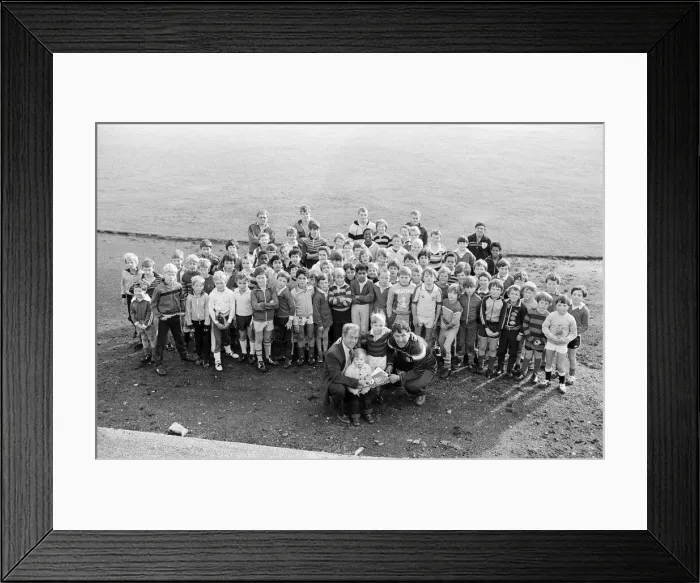 Framed Print : Seventy-six boys, from the age of six to 12, received badges after completing a four-week