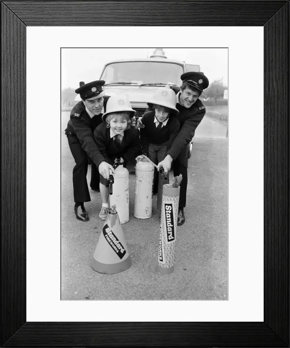 Framed Print : Firemen Geoff Sykes (left) and Mick Senior spell out a Bonfire Night fire safety message Framed Print : Firemen Geoff Sykes (left) and Mick Senior spell out a Bonfire Night fire safety message