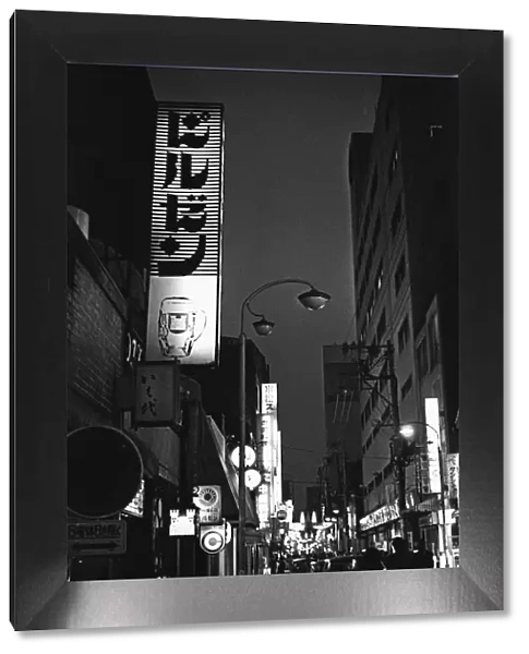 Night time in Ginza Tokyos Nightclub District, where hostesses charm customers into
