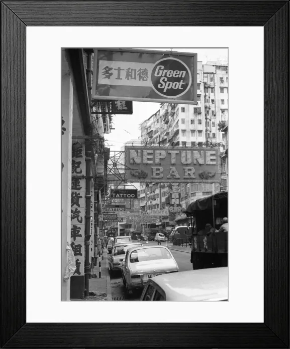 Framed Print : Traffic and signs advertising night clubs, tattoo and massage parlours seen here Framed Print : Traffic and signs advertising night clubs, tattoo and massage parlours seen here