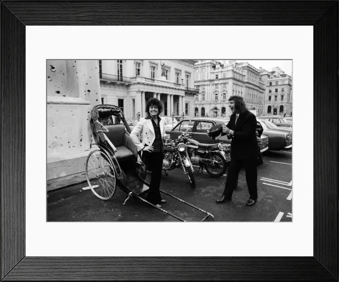 Framed Print : Singer Marc Bolan in a rickshaw in London. Drawing the rickshaw is Alphie O Leary Framed Print : Singer Marc Bolan in a rickshaw in London. Drawing the rickshaw is Alphie O Leary