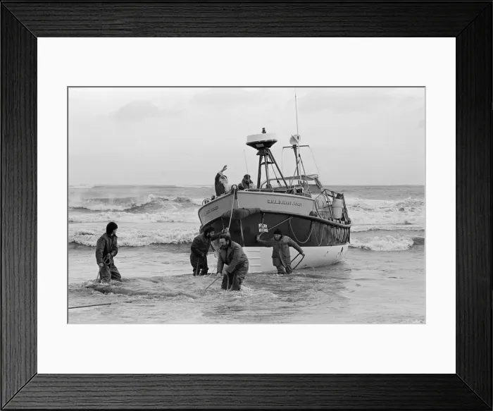 Framed Print : Father Christmas arrives to Newbiggin by lifeboat. Northumberland, December 1985 Framed Print : Father Christmas arrives to Newbiggin by lifeboat. Northumberland, December 1985