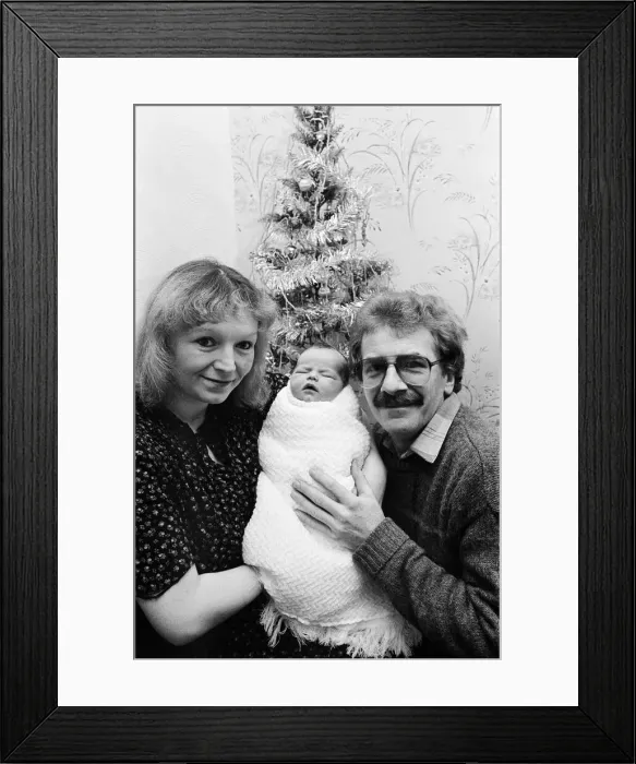 Framed Print : Christmas day baby. Teesside, circa 25th December 1985