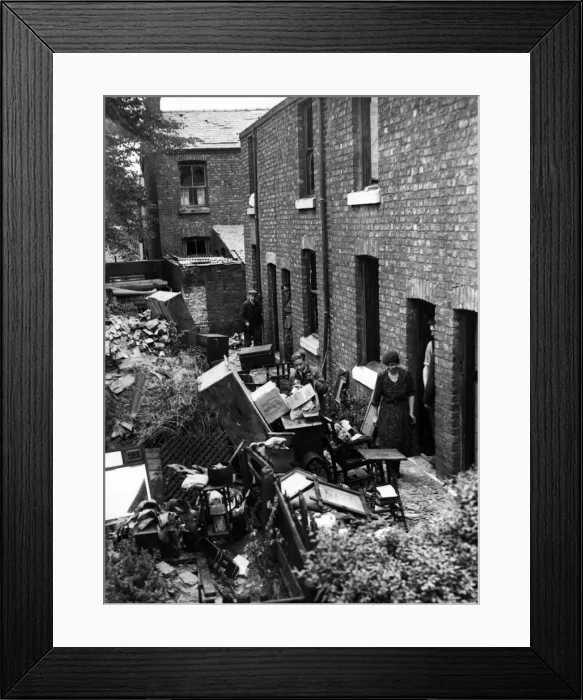 Framed Print : Bomb damage in Liverpool. Residents in these cottages salvaging their belongings after an Framed Print : Bomb damage in Liverpool. Residents in these cottages salvaging their belongings after an
