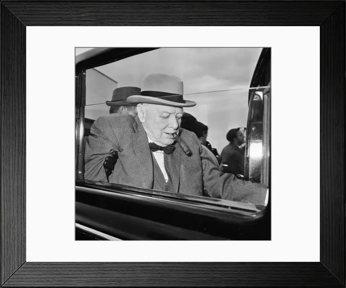 Framed Print : Winston Churchill pictured at London airport as he returns to England from holiday in