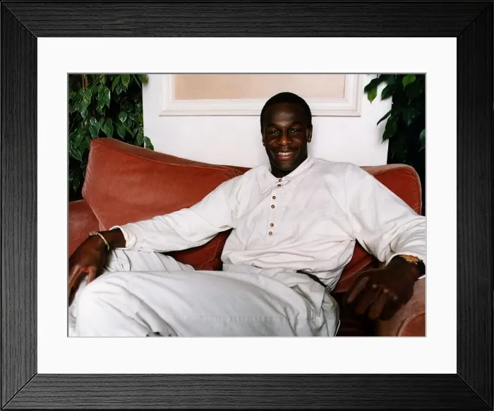 Framed Print : Justin Fashanu of Hearts relaxing in his new flat which costs 1000 per week to rent Framed Print : Justin Fashanu of Hearts relaxing in his new flat which costs 1000 per week to rent