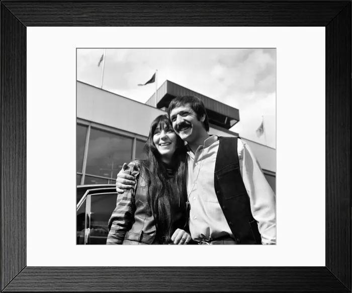 Framed Print : American pop singers Sonny and Cher on arrival at Heathrow Airport. 5th April 1969