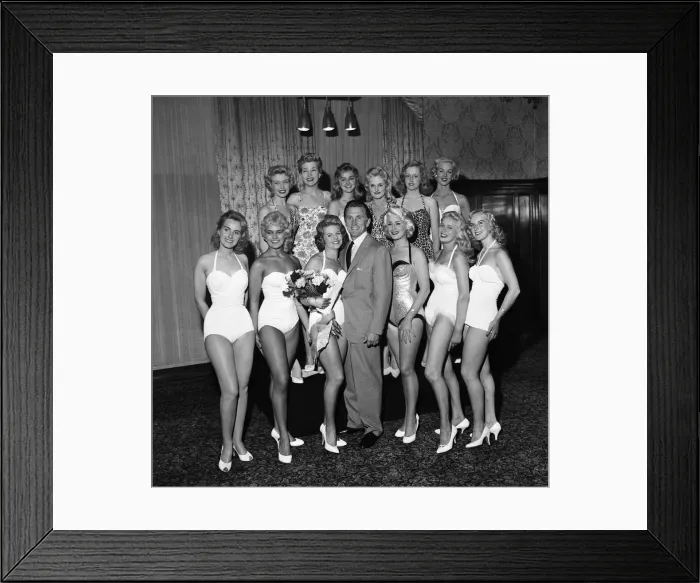 Framed Print : Kirk Douglas selects 21-year-old Marilyn Davies as the winner of the Viking Beauty Framed Print : Kirk Douglas selects 21-year-old Marilyn Davies as the winner of the Viking Beauty