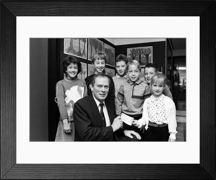 Framed Print : Children give up cash for charity. Children went without pocket money Framed Print : Children give up cash for charity. Children went without pocket money