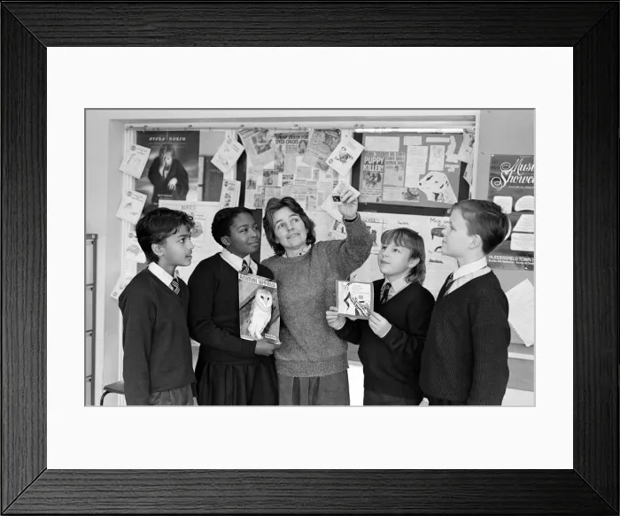 Framed Print : Mrs Sue Berger, RSPCA schools officer, with Fartown High School second-year pupils Framed Print : Mrs Sue Berger, RSPCA schools officer, with Fartown High School second-year pupils
