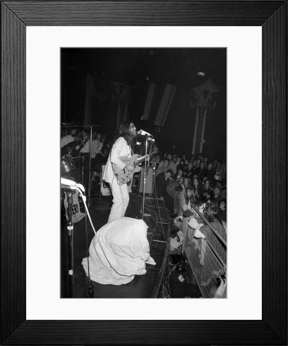 Framed Print : John Lennon and Yoko Ono on stage at the Lyceum. John was playing live for Framed Print : John Lennon and Yoko Ono on stage at the Lyceum. John was playing live for
