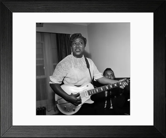 Framed Print : Sister Rosetta Tharpe giving a performance on her guitar. London, 21st November 1957 Framed Print : Sister Rosetta Tharpe giving a performance on her guitar. London, 21st November 1957