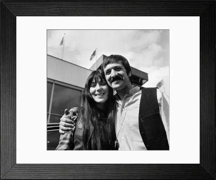 Framed Print : American pop singers Sonny and Cher on arrival at Heathrow Airport. 5th April 1969
