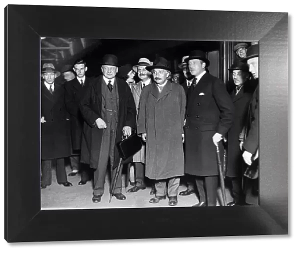 Professor Albert Einstein (centre) pictured upon his arrival at Victoria Station in