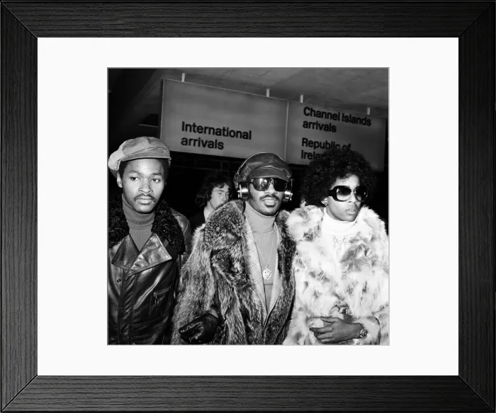 Framed Print : Stevie Wonder arriving at London Airport with Yvonne Wright. 24th January 1974