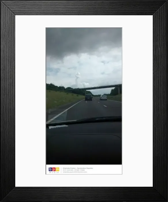 Framed Print : BPM MEDIA This phallic-shaped cloud was spotted looming over the M42 on June 29