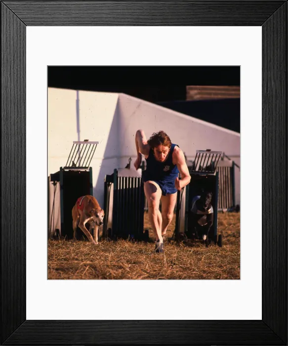 Framed Print : David Jenkins 1974 ex athlete in action racing against greyhounds C  /  T O  / s SP PER