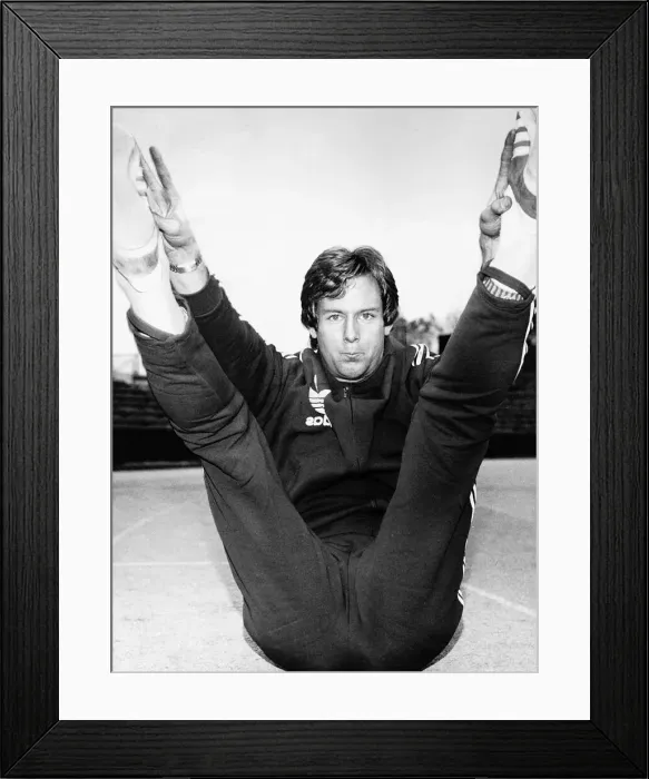 Framed Print : Scottish athlete and track star David Jenkins sitting back with legs in the air touching Framed Print : Scottish athlete and track star David Jenkins sitting back with legs in the air touching