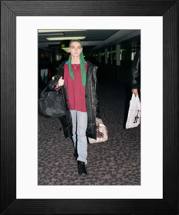 Framed Print : Irish singer Sinead O Connor arriving at Heathrow Airport. 19th October 1992 Framed Print : Irish singer Sinead O Connor arriving at Heathrow Airport. 19th October 1992