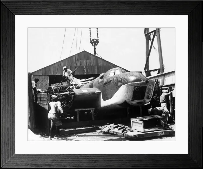 Framed Print : Chinese labourers prising open the case on the arrival of the Bristol Blenheim Mark IV