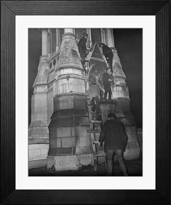 Framed Print : New Years reveller seen here climbing the Chamberlain Memorial in Chamberlain Square