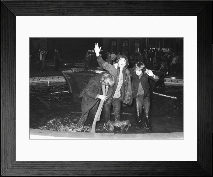 Framed Print : New Year Revellers seeing in 1973 by taking a quick dip in the fountain in Centenary