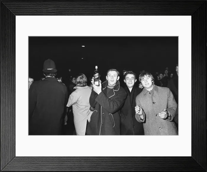 Framed Print : New Years revellers seen here celebrating seeing in 1970 in Ratcliffe Place