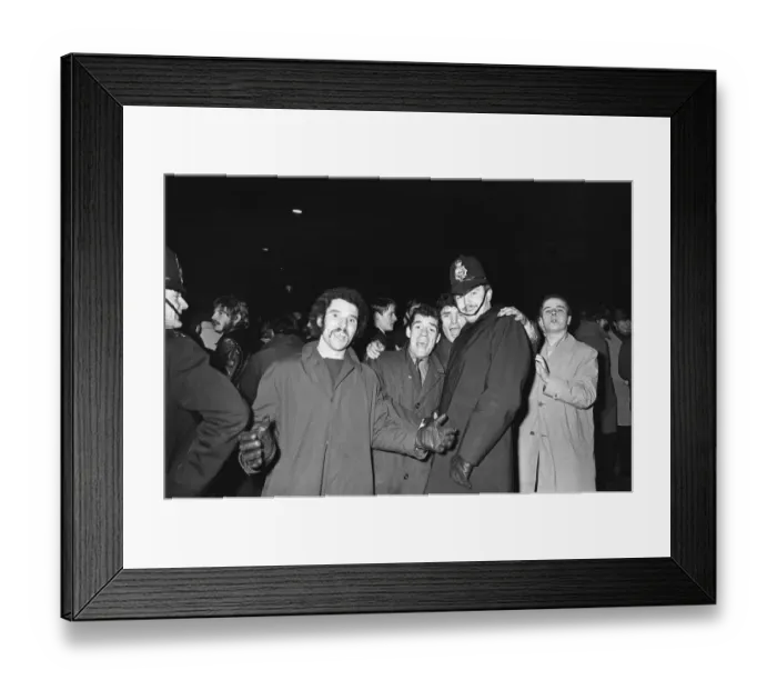 Framed Print : New Years revellers seen here celebrating with police in Ratcliffe Place Framed Print : New Years revellers seen here celebrating with police in Ratcliffe Place