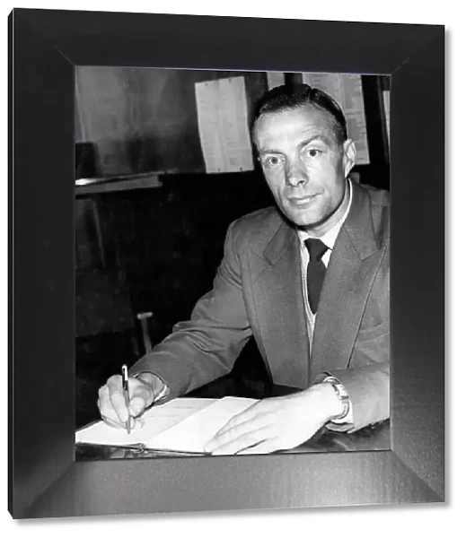 Newcastle United manager Charlie Mitten at his desk. August 1958