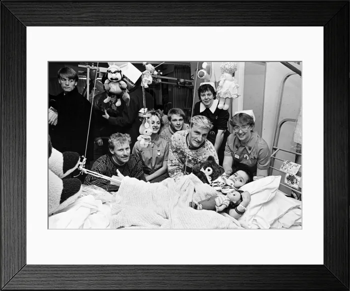 Framed Print : Middlesbrough footballers hand out presents donated by kind-hearted Teessiders to