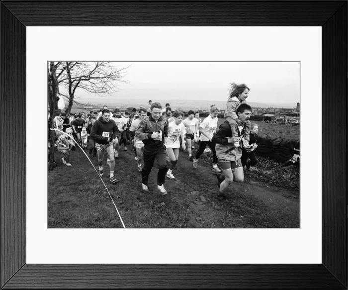 Framed Print : Big-hearted charity runners took time out of their Christmas celebrations for a good