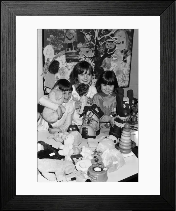 Framed Print : Toy time... looking after the toy stall at a Christmas fair held at Almondbury Infants Framed Print : Toy time... looking after the toy stall at a Christmas fair held at Almondbury Infants