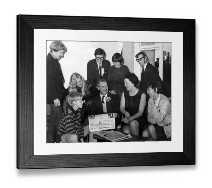 Framed Print : Gwynfor Evans, Plaid Cymru, the new MP for Carmarthen reads the account of his election