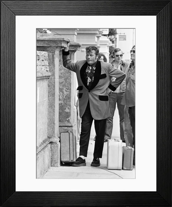 Framed Print : Actor Oliver Reed dressed in Teddy Boy clothing during a break in filming of the pop Framed Print : Actor Oliver Reed dressed in Teddy Boy clothing during a break in filming of the pop