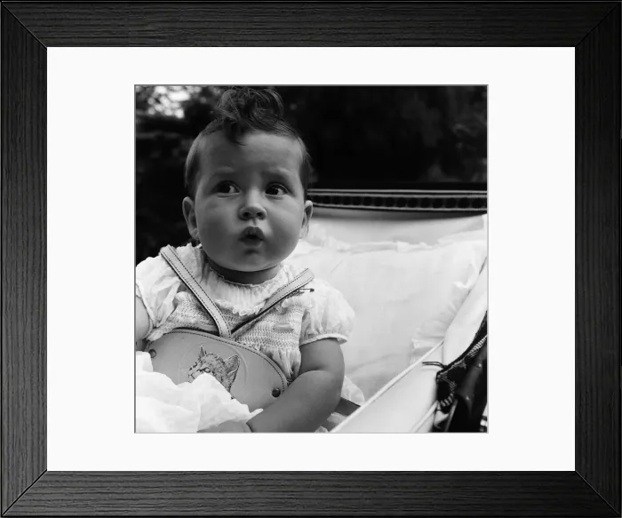 Framed Print : Melissa Nyman, aged nine months, whistles all day long and has been doing so for the past Framed Print : Melissa Nyman, aged nine months, whistles all day long and has been doing so for the past