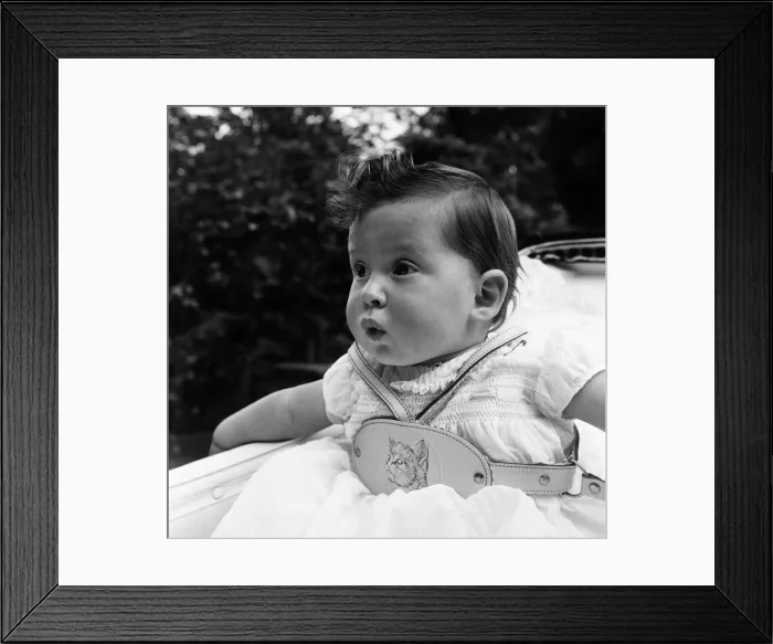 Framed Print : Melissa Nyman, aged nine months, whistles all day long and has been doing so for the past
