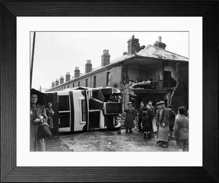 Framed Print : Birmingham Blitz during the Second World War. A bus over turned in Sparbrook Framed Print : Birmingham Blitz during the Second World War. A bus over turned in Sparbrook