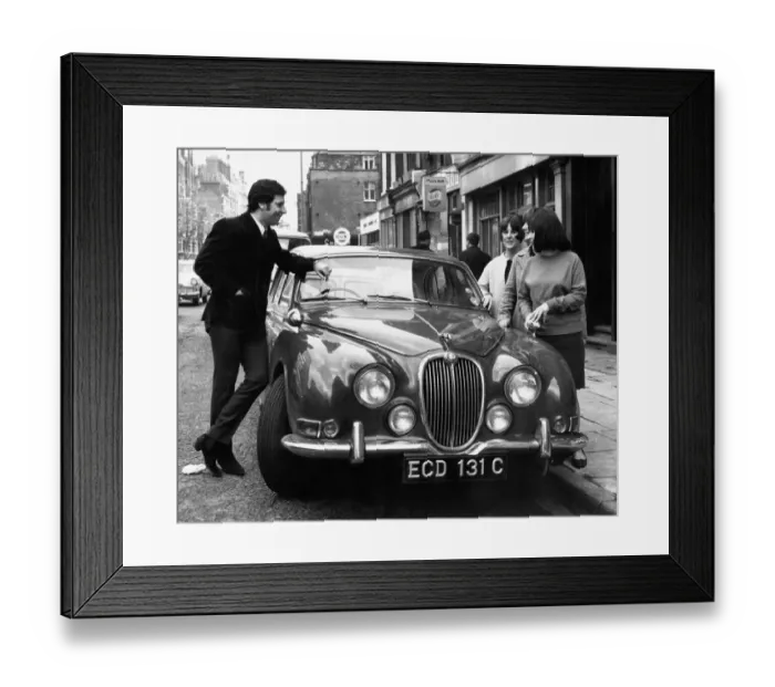 Framed Print : Welsh singing star Tom Jones shows off his new Jaguar car to three young fans in London Framed Print : Welsh singing star Tom Jones shows off his new Jaguar car to three young fans in London
