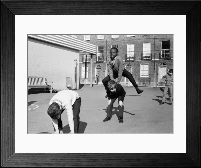 Framed Print : Children playing at Penton Junior School, Islington, North London, 11th March 1971 Framed Print : Children playing at Penton Junior School, Islington, North London, 11th March 1971