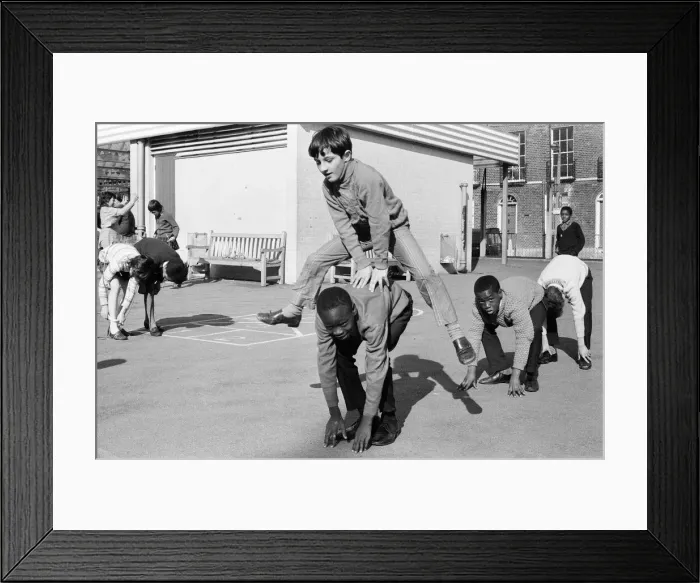Framed Print : Children playing at Penton Junior School, Islington, North London, 11th March 1971 Framed Print : Children playing at Penton Junior School, Islington, North London, 11th March 1971
