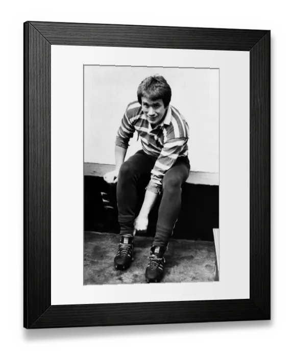 Framed Print : Alan Tovey, rugby player with Ebbw Vale RFC, pictured putting his shoes on. Circa 1977