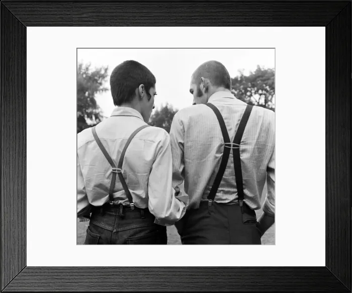 Framed Print : Two young people wearing skinhead fashions. Glenda Peake and Tony Hughes Framed Print : Two young people wearing skinhead fashions. Glenda Peake and Tony Hughes