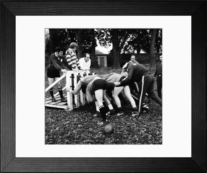 Framed Print : Welsh Rugby Team, Training Session, 8th November 1973. Geoff Wheel, standing on gate
