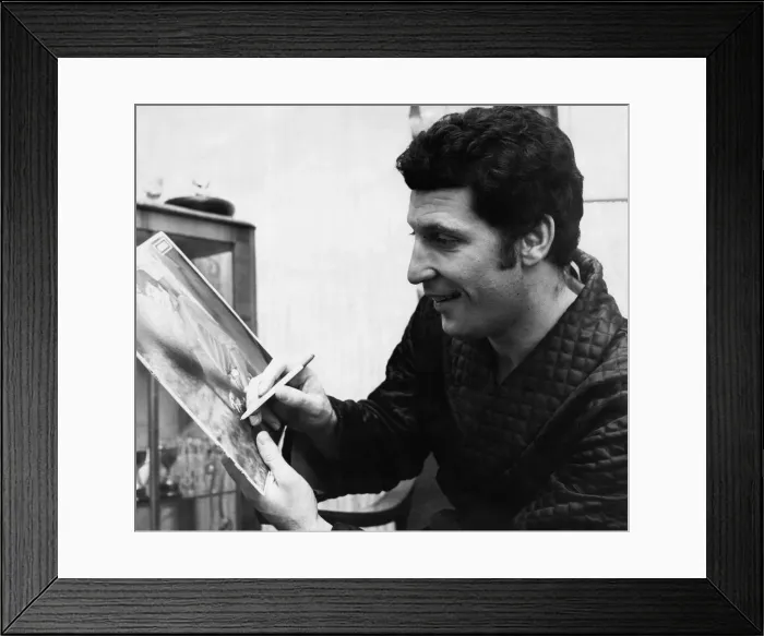 Framed Print : Welsh singing star Tom Jones signs a picture for a fan. 25 October 1966 Framed Print : Welsh singing star Tom Jones signs a picture for a fan. 25 October 1966