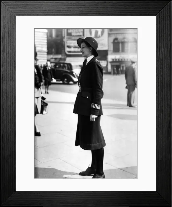 Framed Print : Policewoman on duty in Piccadilly Circus, London during the Second World War Framed Print : Policewoman on duty in Piccadilly Circus, London during the Second World War