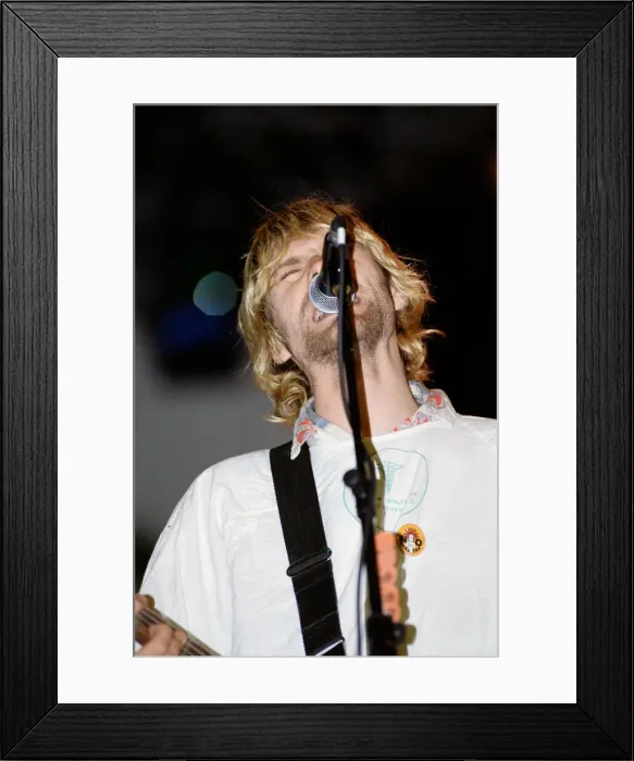 Framed Print : Kurt Cobain, lead singer of Seattle-based grunge rock group Nirvana Framed Print : Kurt Cobain, lead singer of Seattle-based grunge rock group Nirvana